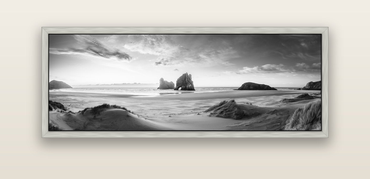 Sands of Time, Wharariki Beach — silver float frame canvas, 152 × 56 cm. New Zealand fine art landscape wall art by Stephen Milner.