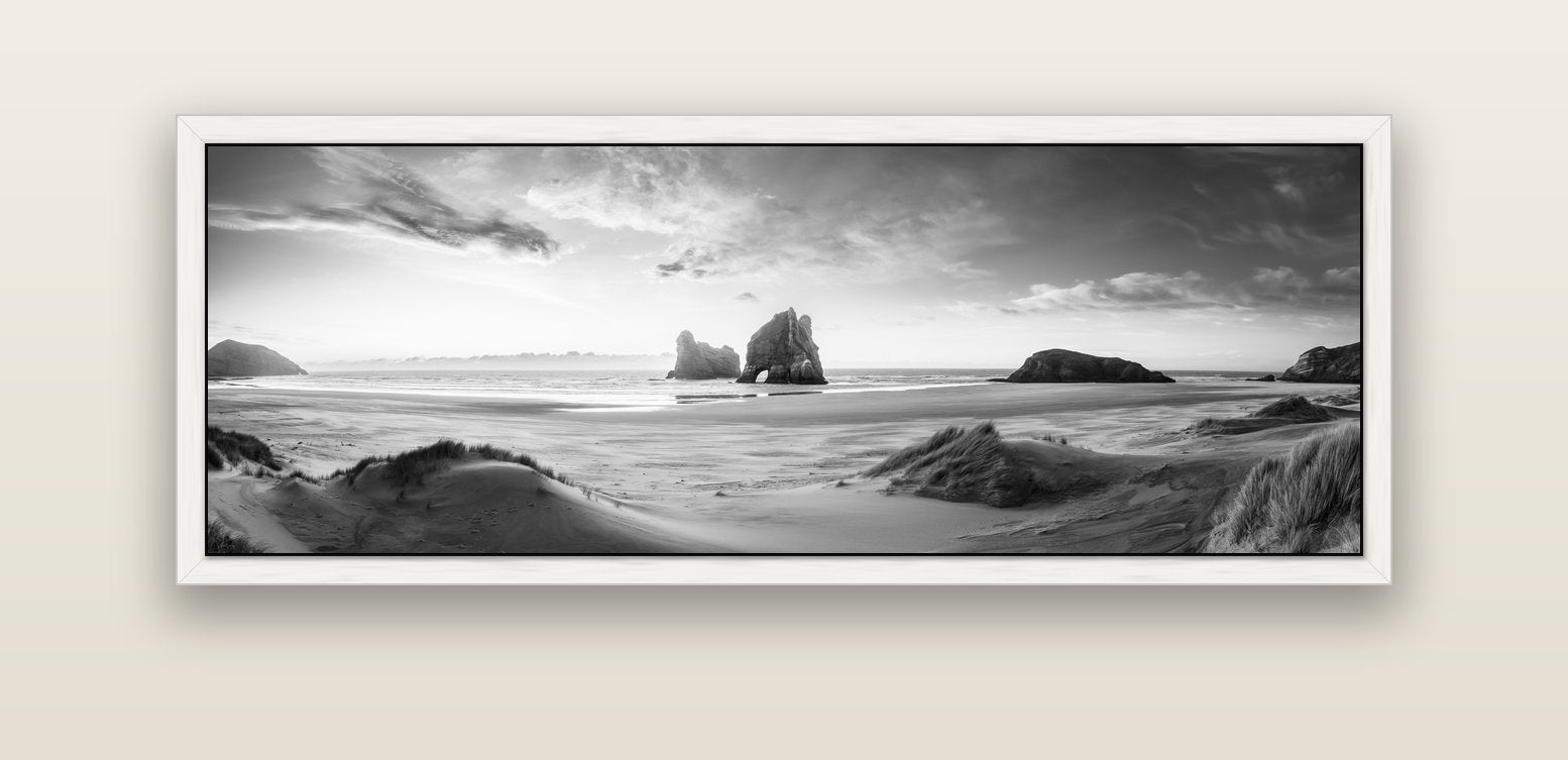 Sands of Time, Wharariki Beach — white float frame canvas, 152 × 56 cm. New Zealand fine art landscape wall art by Stephen Milner.
