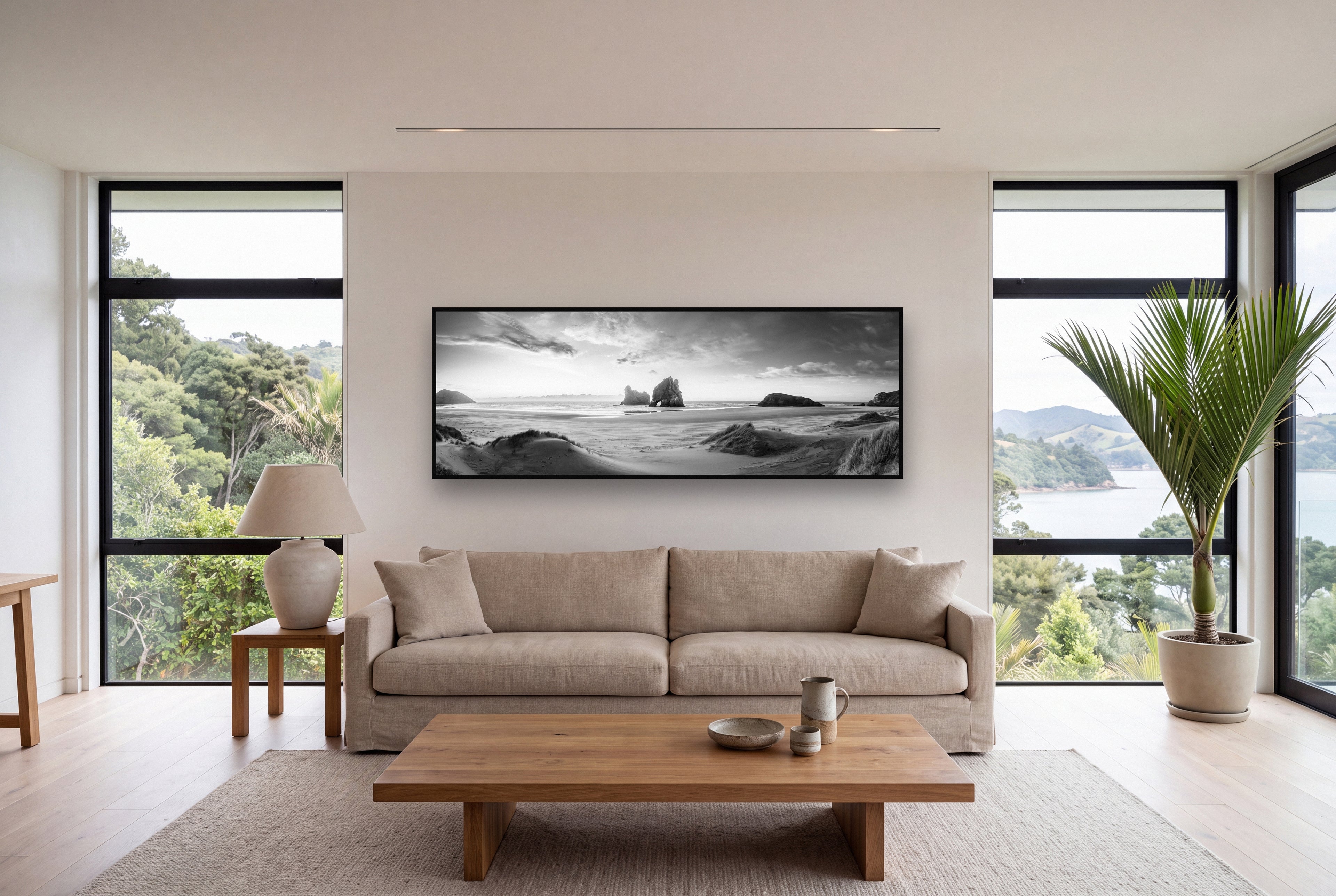 Sands of Time, Wharariki Beach shown as large black and white wall art in a styled room, fine art by Stephen Milner.