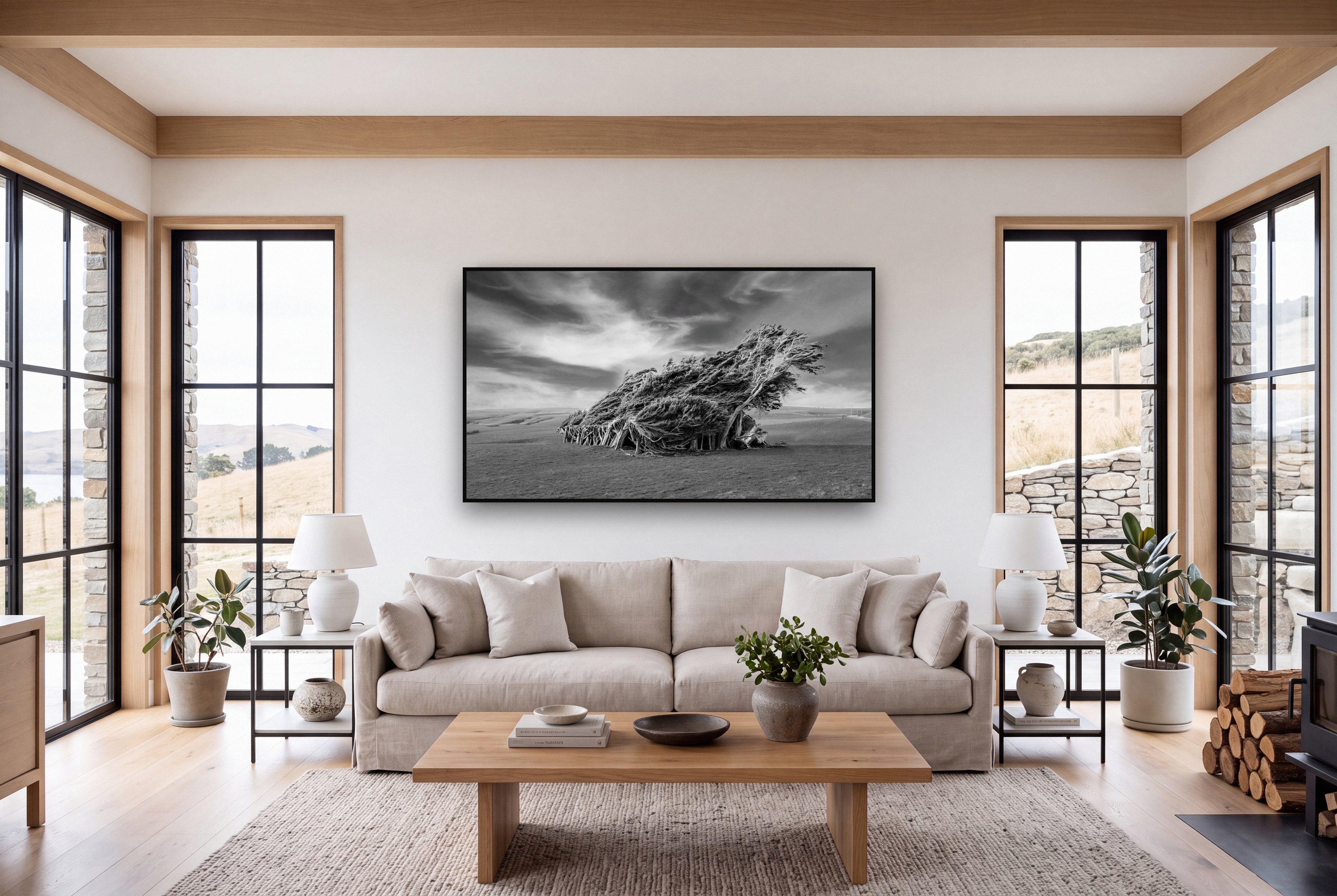 Sculpted by the Winds, Trees of Slope Point shown as large black and white wall art in a styled room, fine art by Stephen Milner.
