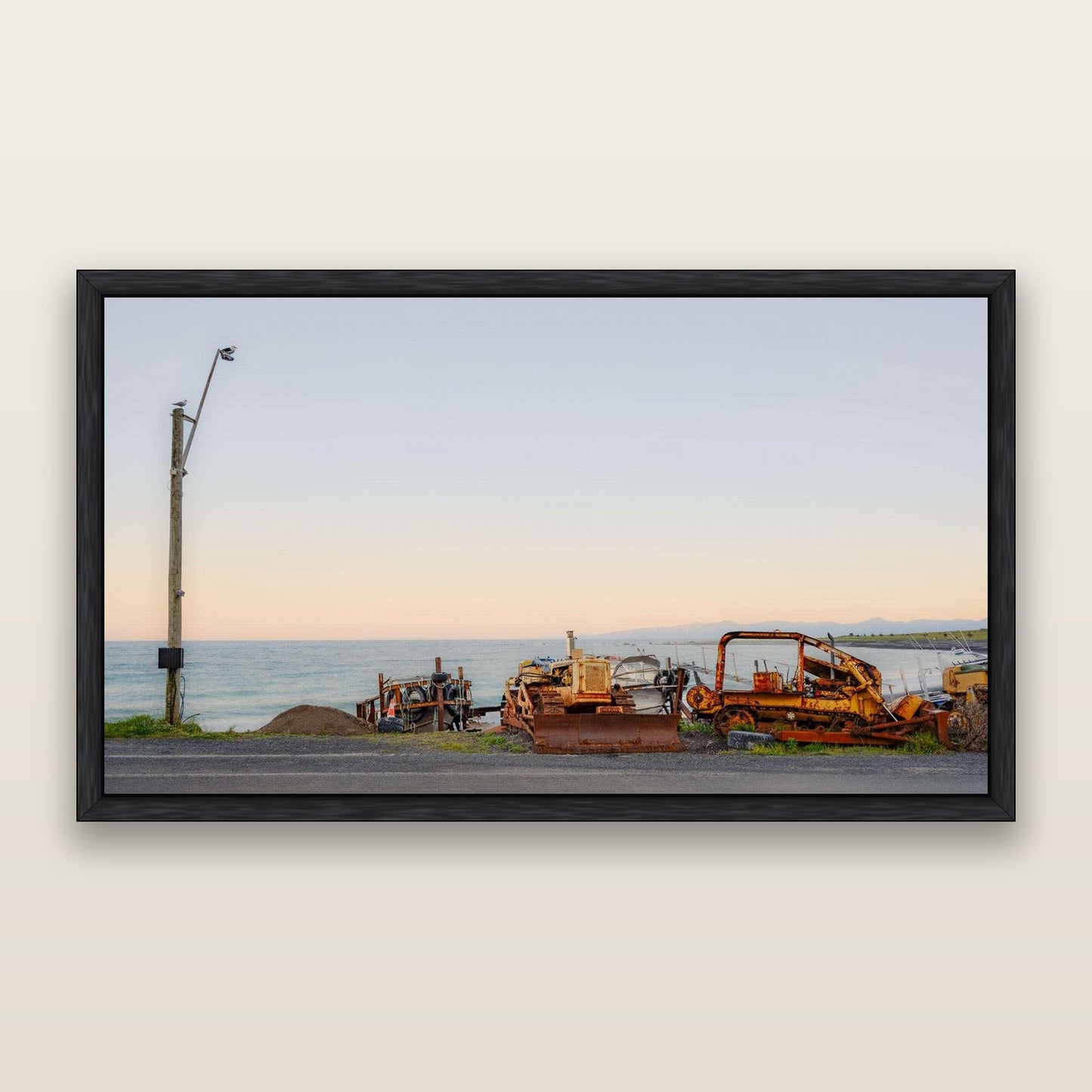 Seaside Work, Cape Palliser — framed metallic canvas print, Black frame. New Zealand fine art landscape wall art by Stephen Milner.