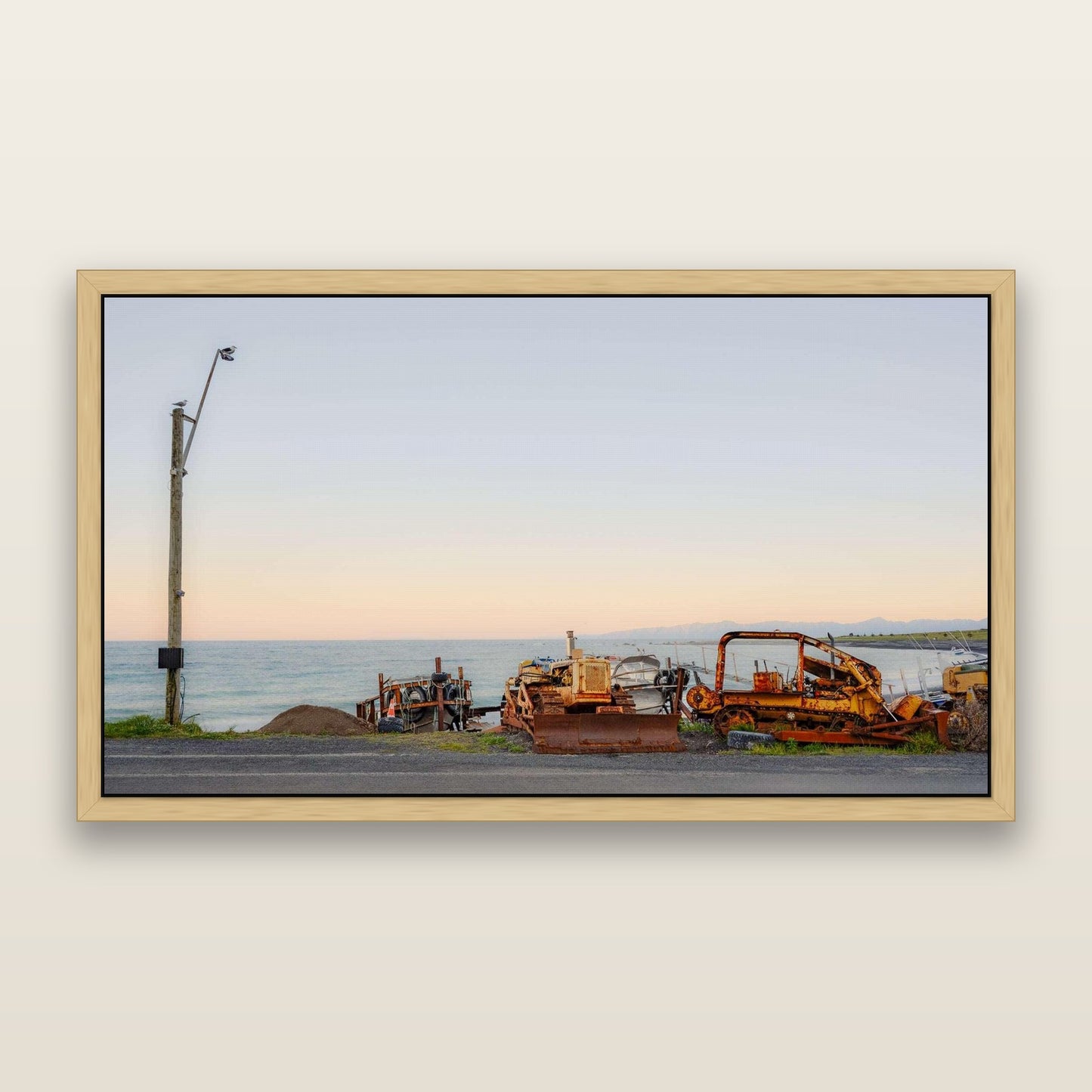 Seaside Work, Cape Palliser — framed metallic canvas print, Natural frame. New Zealand fine art landscape wall art by Stephen Milner.
