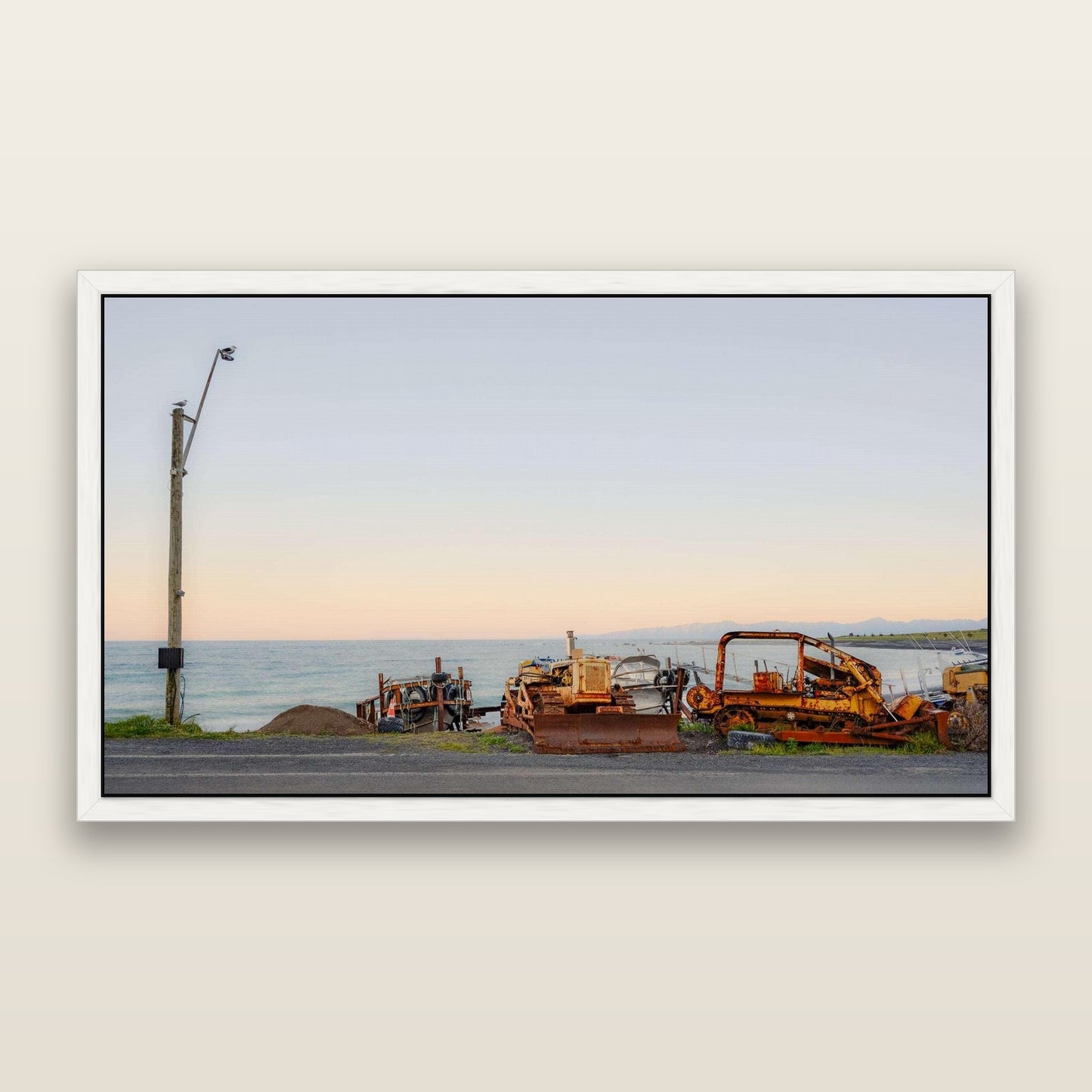 Seaside Work, Cape Palliser — framed metallic canvas print, White frame. New Zealand fine art landscape wall art by Stephen Milner.
