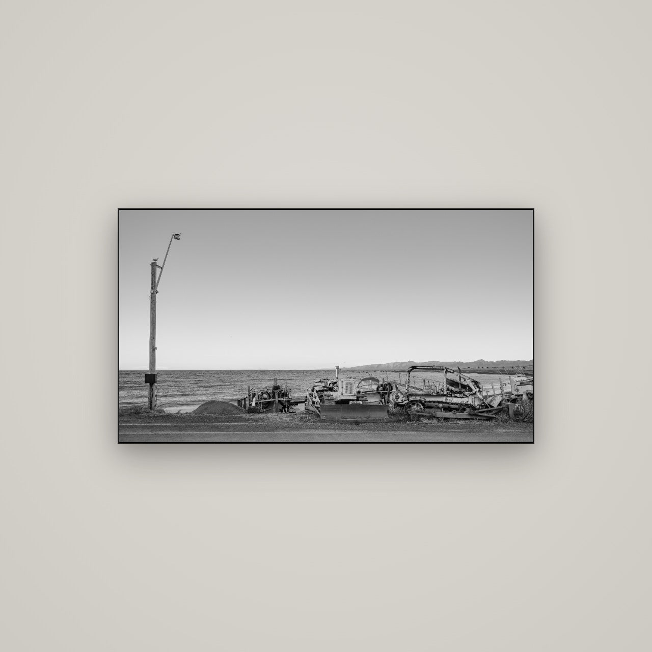 Seaside Work, Cape Palliser — Slimline Black, 107×60 cm. New Zealand fine art wall art by Stephen Milner.