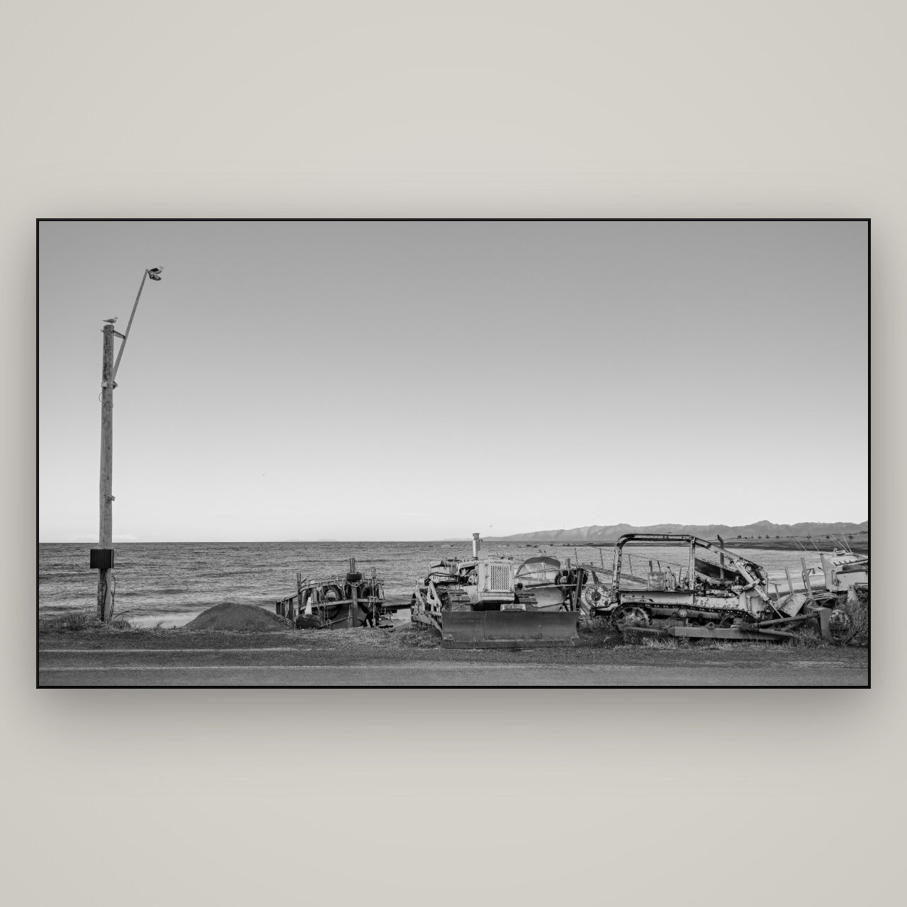 Seaside Work, Cape Palliser — Slimline Black, 196×110 cm. New Zealand fine art wall art by Stephen Milner.