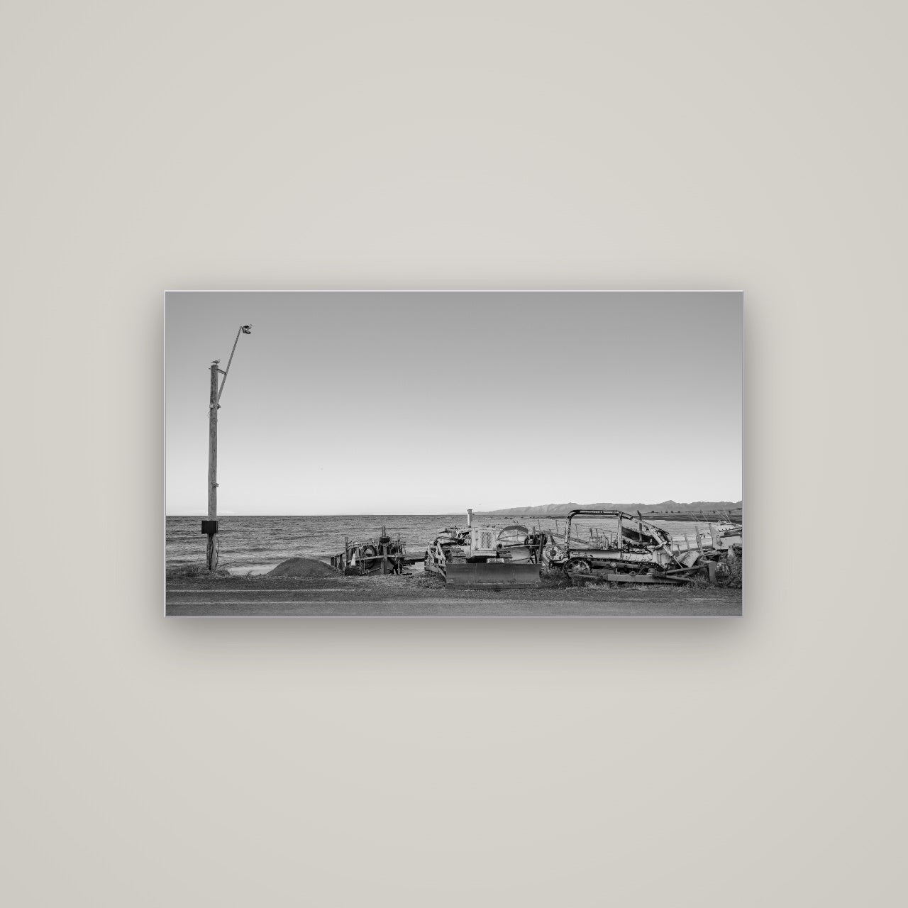 Seaside Work, Cape Palliser — Slimline Silver, 107×60 cm. New Zealand fine art wall art by Stephen Milner.