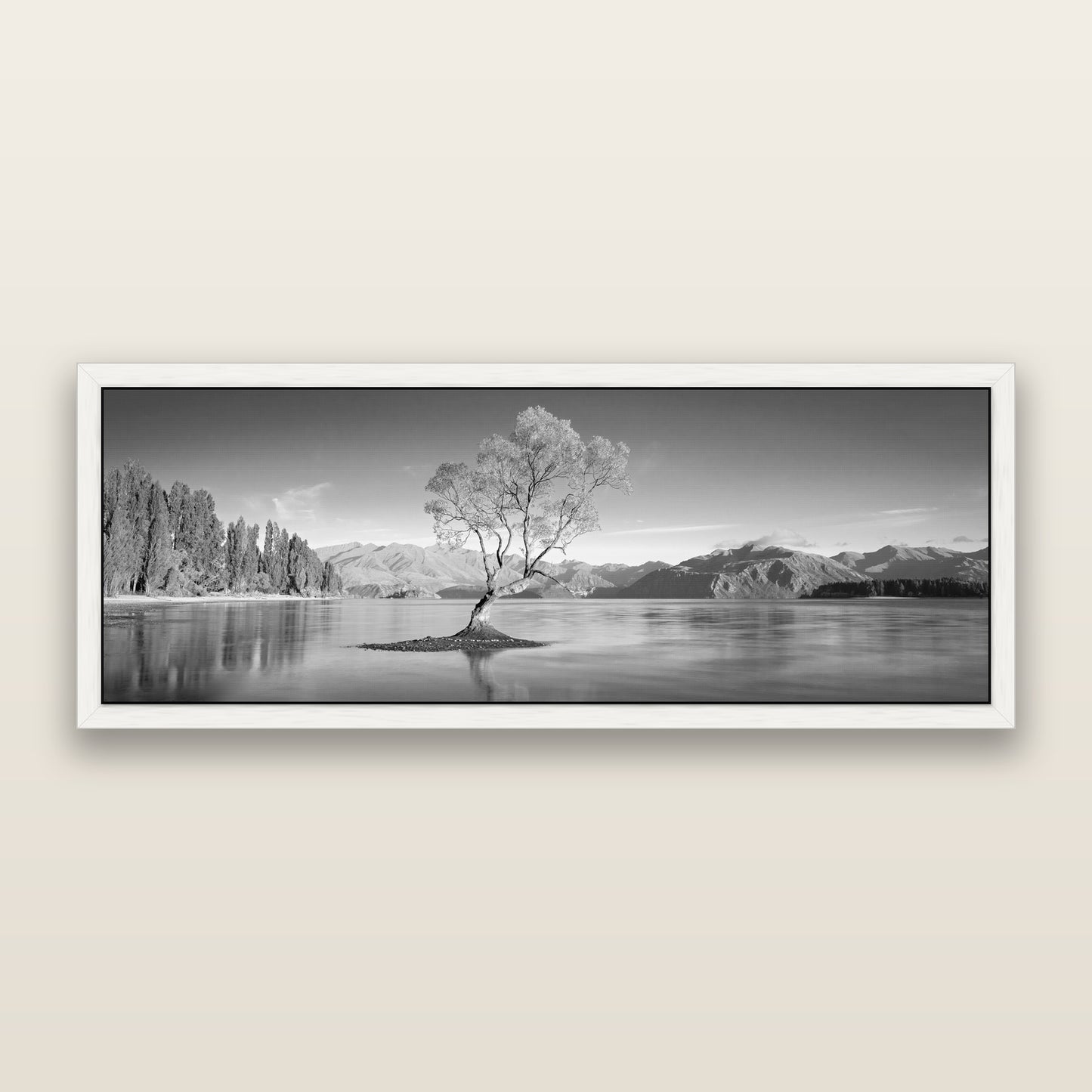 Solitude in the Shallows, Lake Wanaka, black and white framed metallic canvas print, White frame. New Zealand fine art wall art by Stephen Milner.