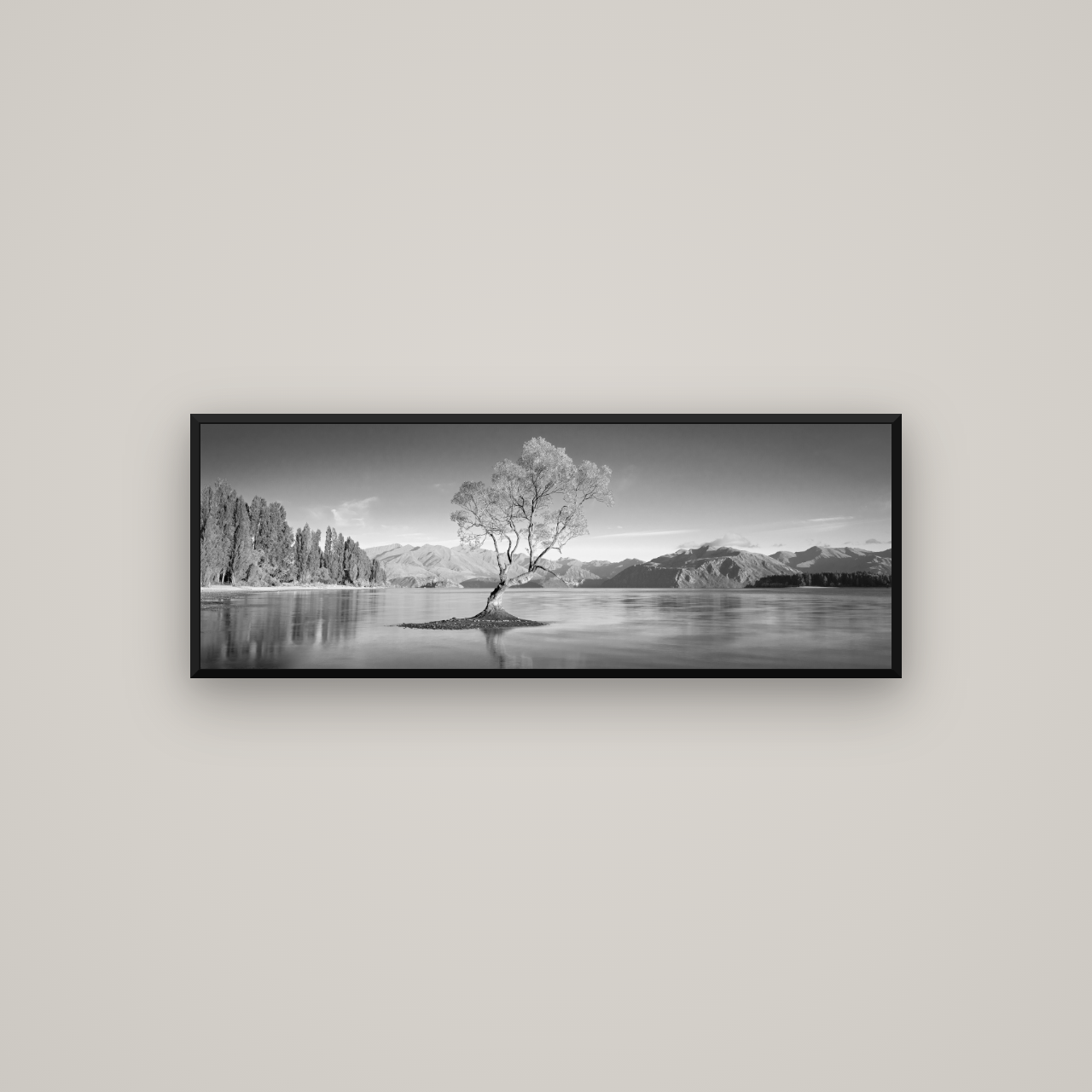 Solitude in the Shallows, Lake Wanaka — Basel Black Matte, 113×40 cm. New Zealand fine art wall art by Stephen Milner.
