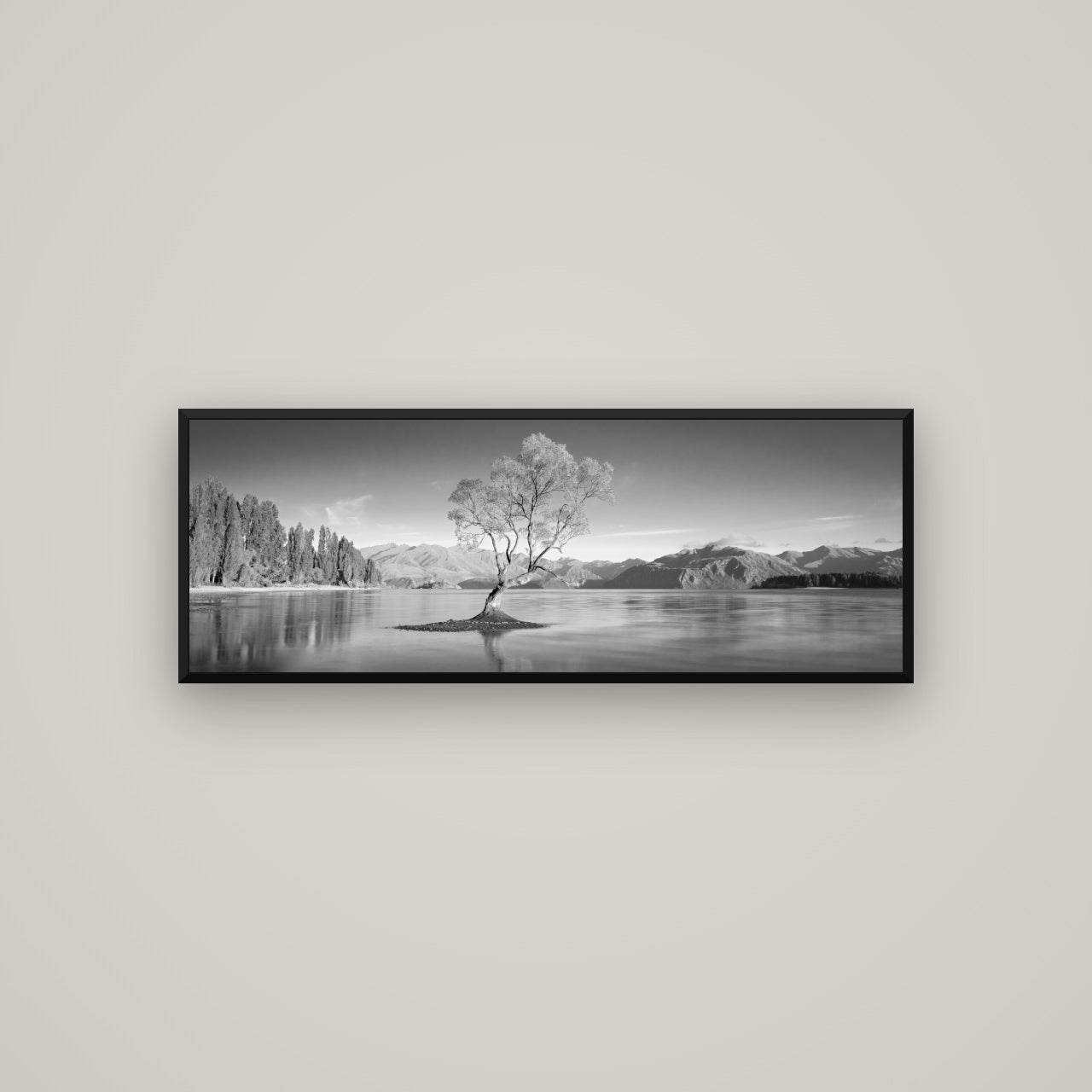 Solitude in the Shallows, Lake Wanaka — Basel Black, 113×40 cm. New Zealand fine art wall art by Stephen Milner.