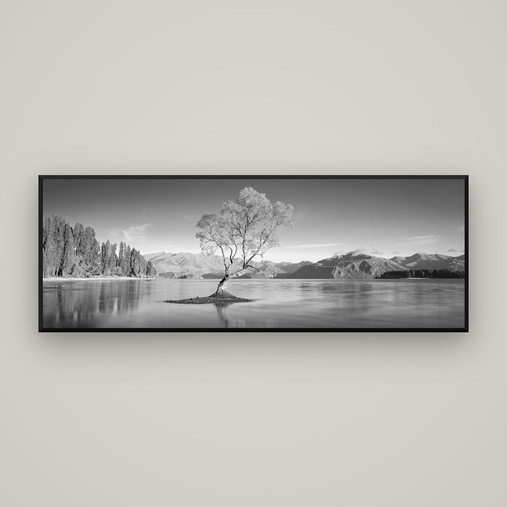 Solitude in the Shallows, Lake Wanaka — Basel Black Matte, 170×60 cm. New Zealand fine art wall art by Stephen Milner.