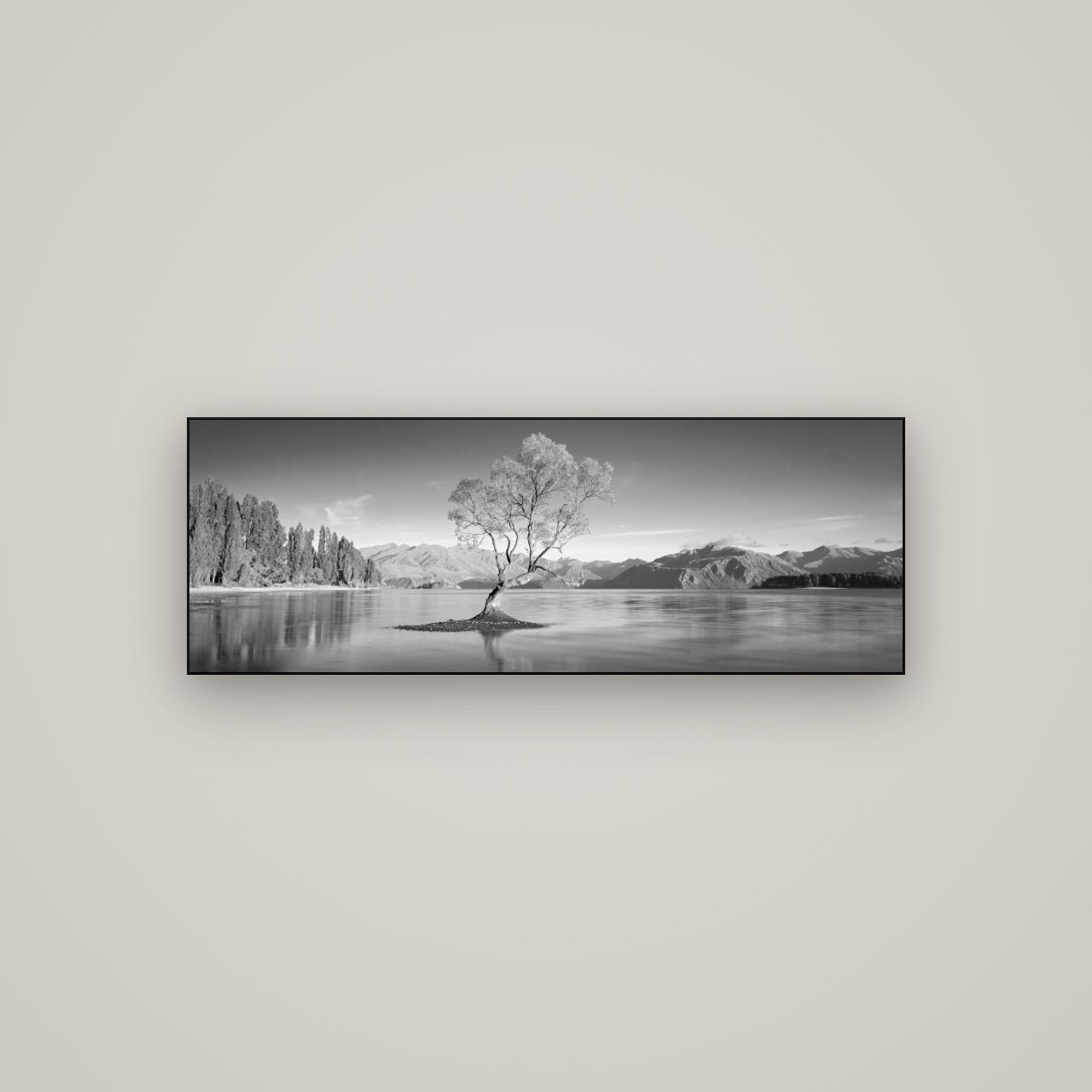 Solitude in the Shallows, Lake Wanaka — Slimline Black, 113×40 cm. New Zealand fine art wall art by Stephen Milner.