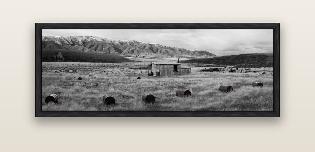 Solitude in the Wild, Barrels of Resilience — black float frame canvas, 152 × 56 cm. New Zealand fine art landscape wall art by Stephen Milner.