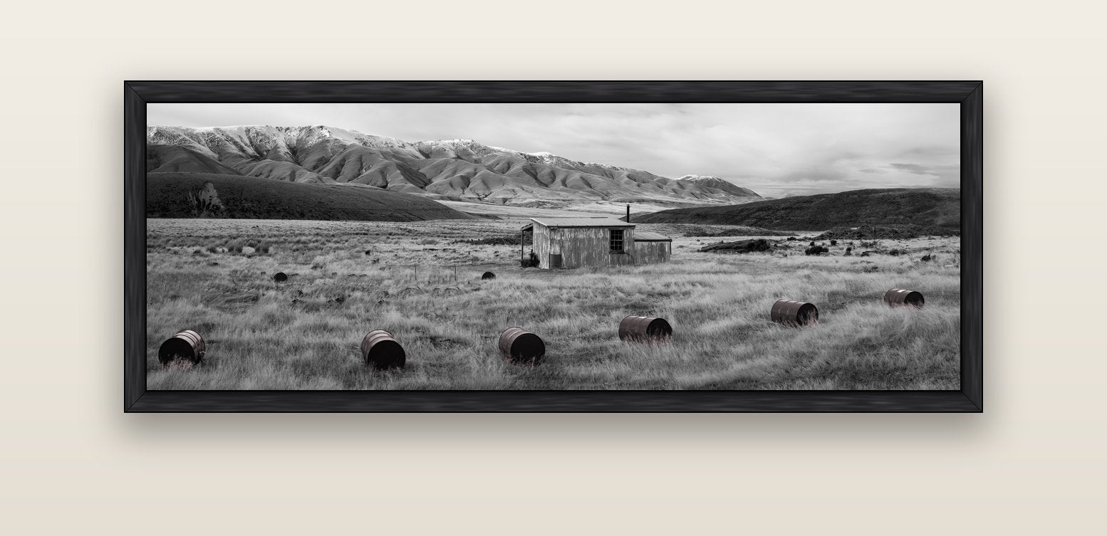 Solitude in the Wild, Barrels of Resilience — black float frame canvas, 152 × 56 cm. New Zealand fine art landscape wall art by Stephen Milner.