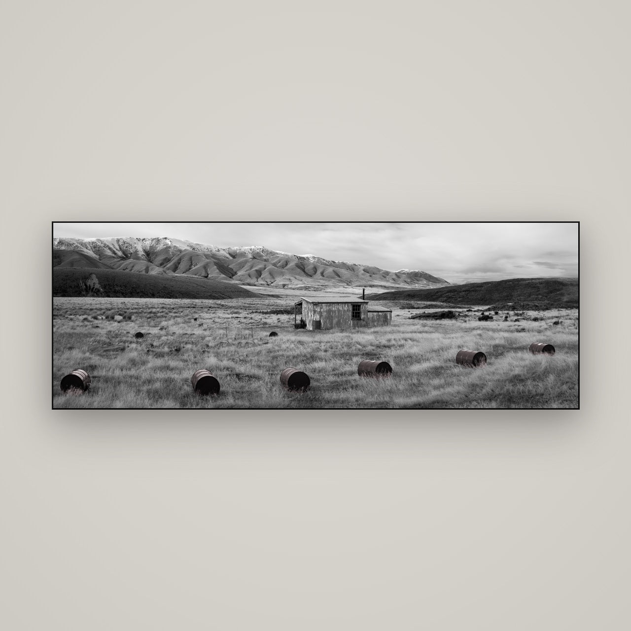Solitude in the Wild, Barrels of Resilience — Slimline Black, 170×60 cm. New Zealand fine art wall art by Stephen Milner.