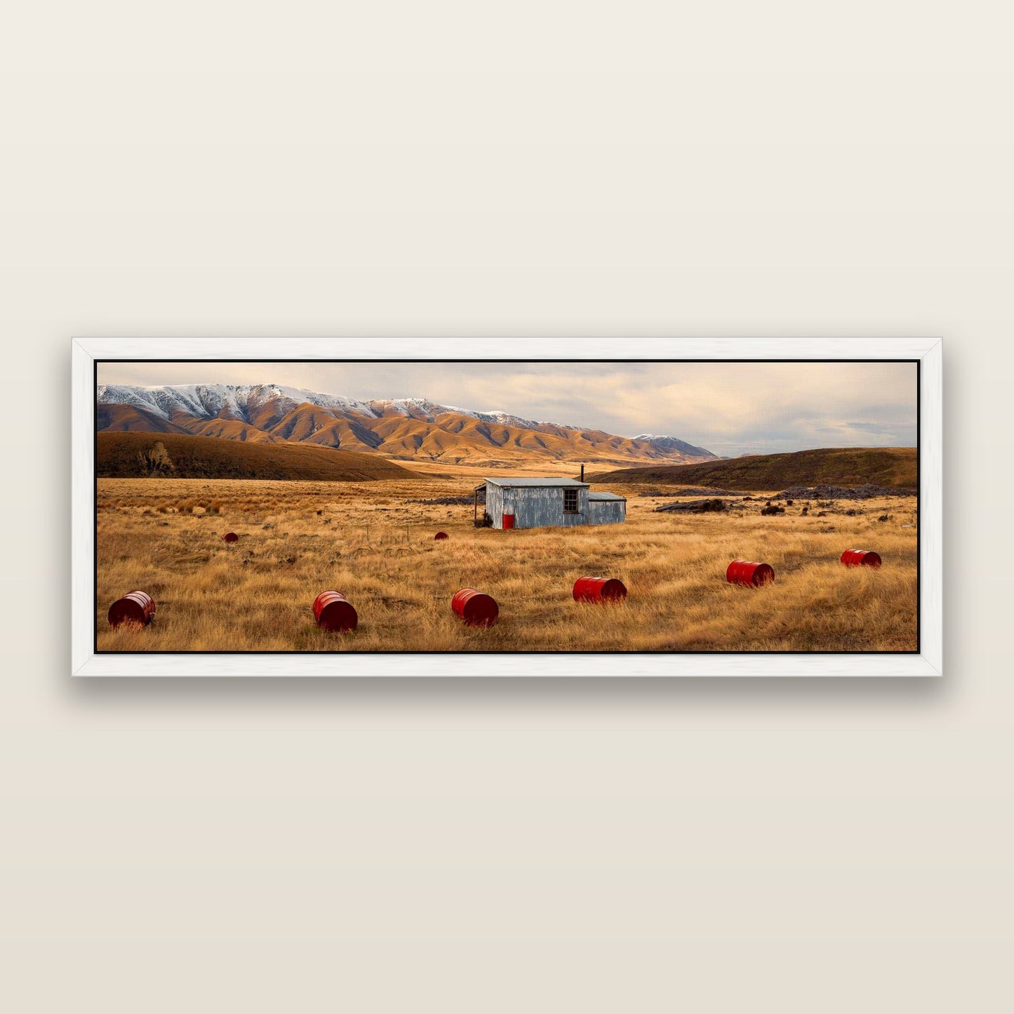 Solitude in the Wild, Red Barrels of Resilience — framed metallic canvas print, White frame. New Zealand fine art landscape wall art by Stephen Milner.