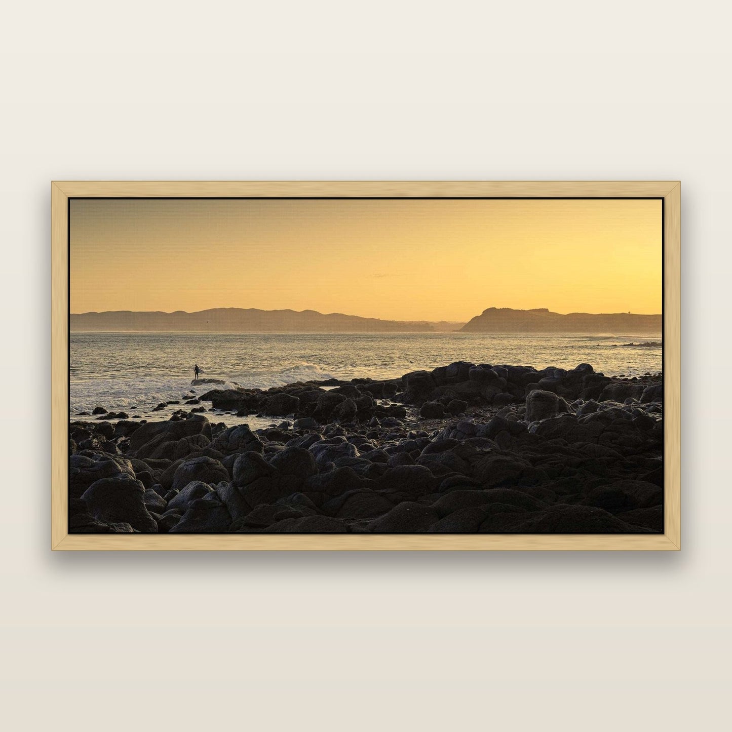 Surfing the Sunrise, Raglan — framed metallic canvas print, Natural frame. New Zealand fine art landscape wall art by Stephen Milner.
