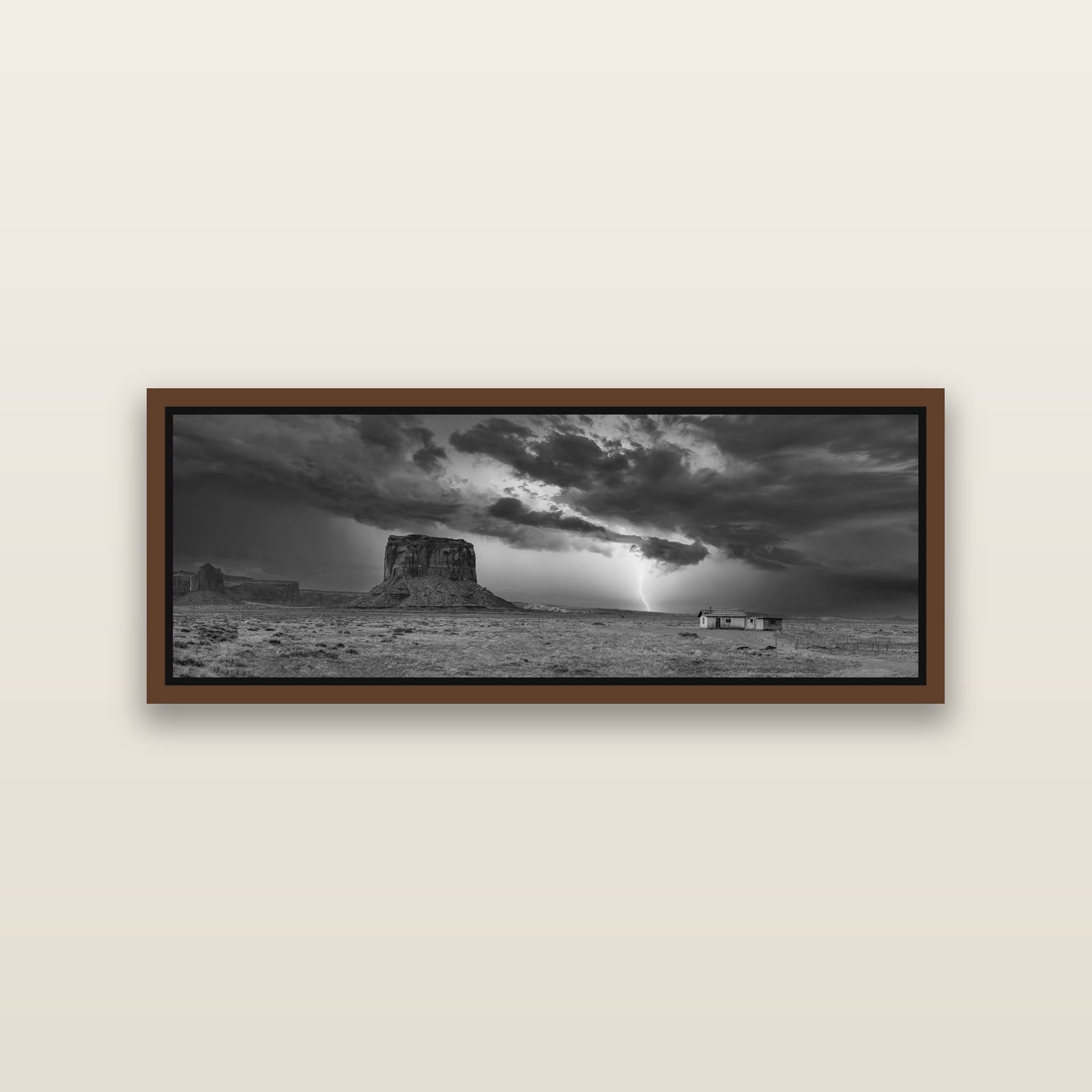 Thunderstrike, Navajo's Monument Storm — Brown framed metallic canvas print, small 86 × 30 cm. New Zealand fine art landscape wall art by Stephen Milner.