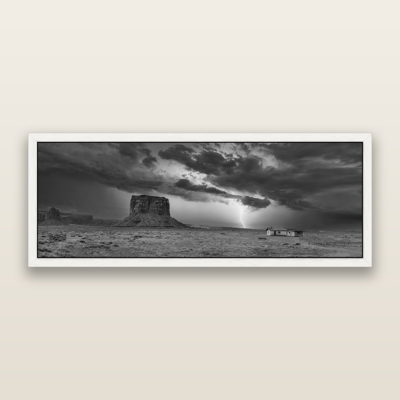 Thunderstrike, Navajo's Monument Storm, black and white framed metallic canvas print, White frame. New Zealand fine art wall art by Stephen Milner.