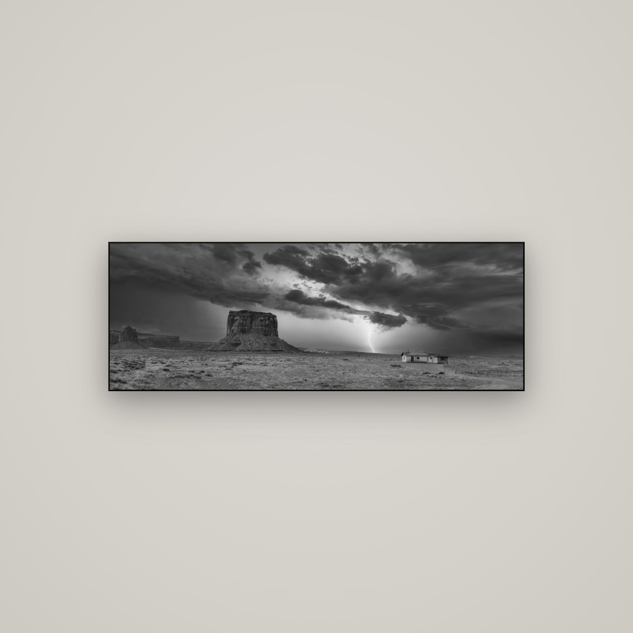 Thunderstrike, Navajo's Monument Storm — Slimline Black, 113×40 cm. New Zealand fine art wall art by Stephen Milner.