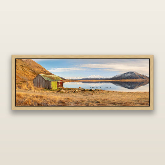 Tranquility's Hut, Big Hill and Potts Range — framed metallic canvas print, Natural frame. New Zealand fine art landscape wall art by Stephen Milner.