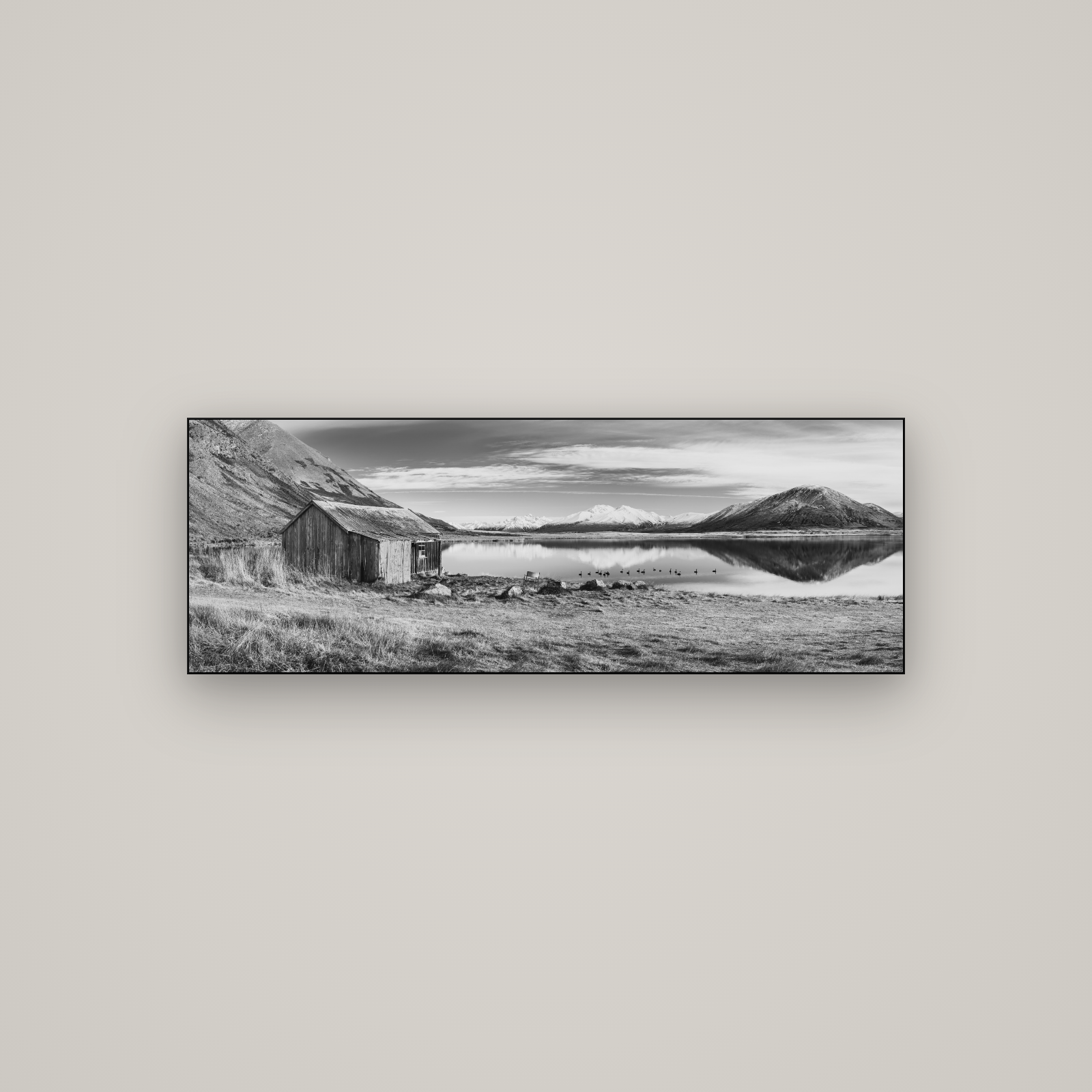 Tranquility's Hut, Big Hill and Potts Range — Slimline Black, 113×40 cm. New Zealand fine art wall art by Stephen Milner.