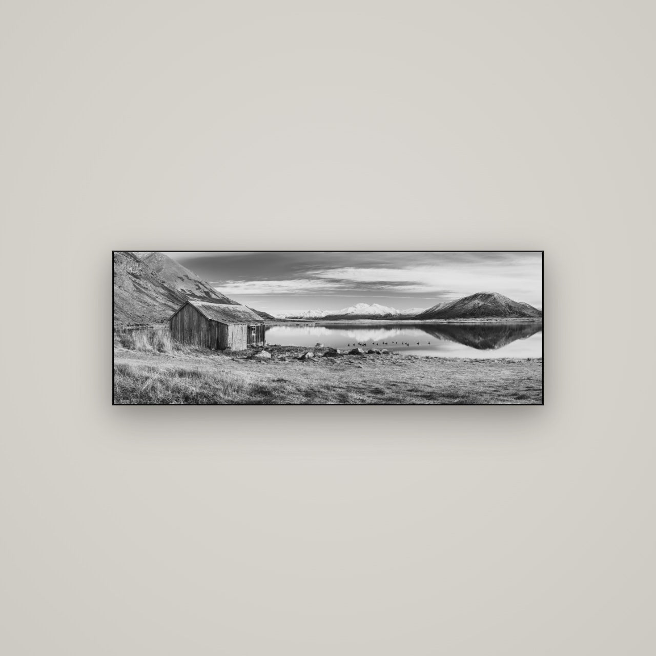 Tranquility's Hut, Big Hill and Potts Range — Slimline Black, 113×40 cm. New Zealand fine art wall art by Stephen Milner.