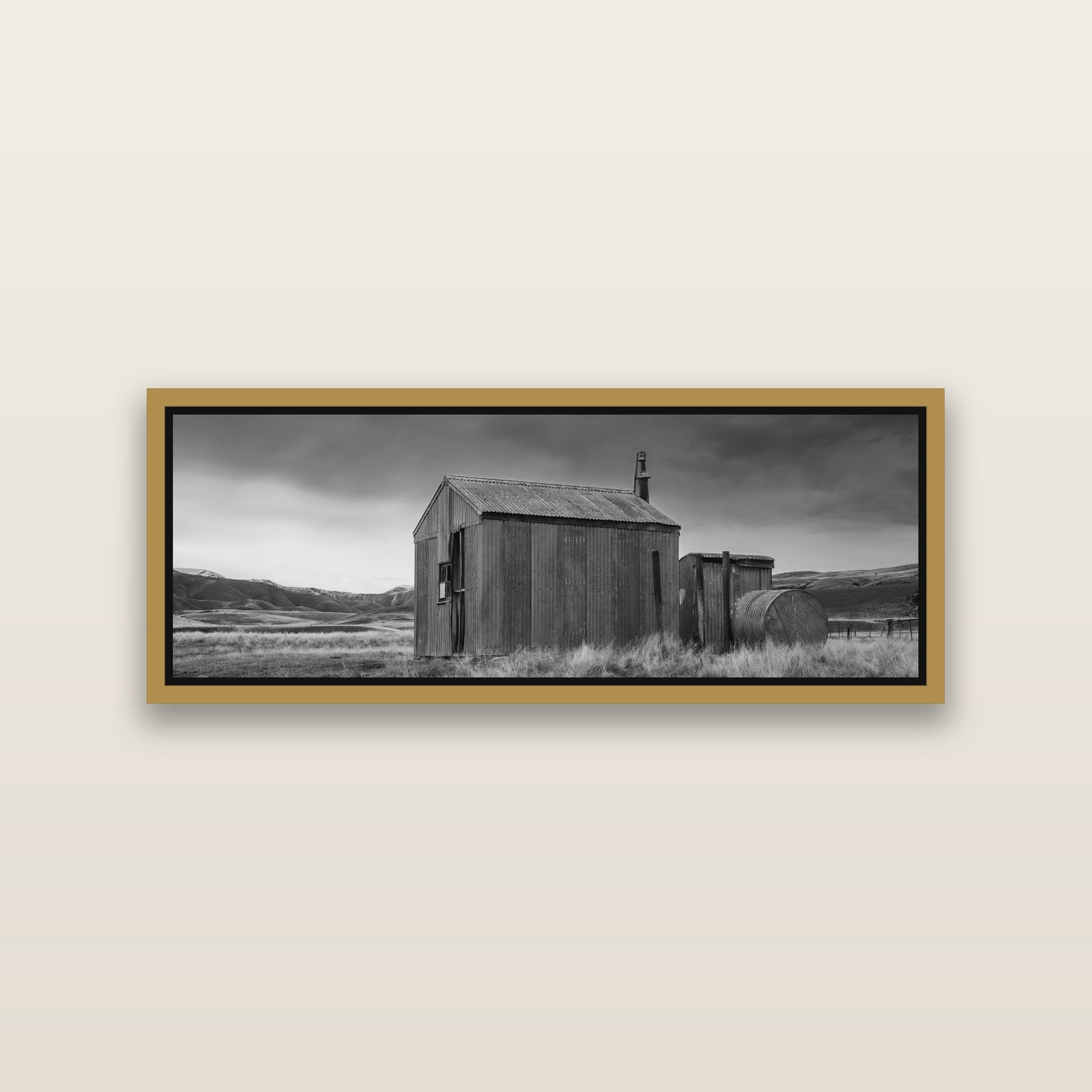 Whispers of Solitude, The Iron Hut — Antique Gold framed metallic canvas print, small 86 × 30 cm. New Zealand fine art landscape wall art by Stephen Milner.
