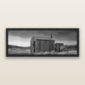 Whispers of Solitude, The Iron Hut, black and white framed metallic canvas print, Black frame. New Zealand fine art wall art by Stephen Milner.
