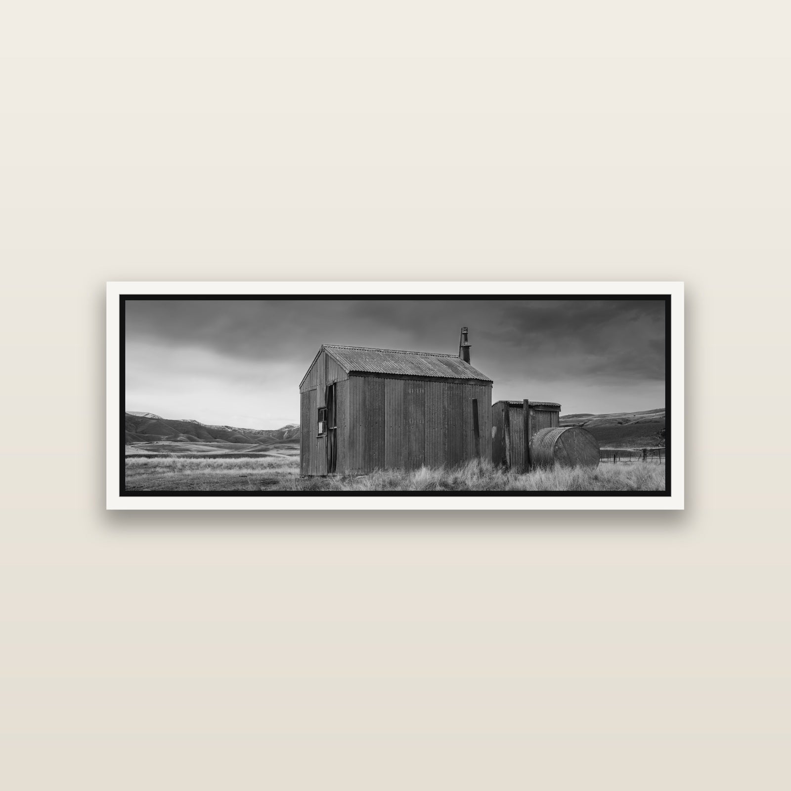 Whispers of Solitude, The Iron Hut — White framed metallic canvas print, small 86 × 30 cm. New Zealand fine art landscape wall art by Stephen Milner.