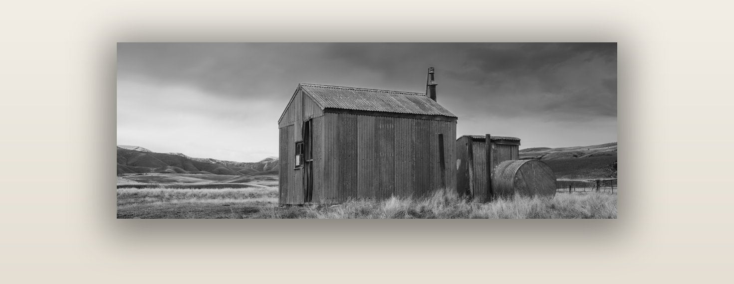 Whispers of Solitude, The Iron Hut — acrylic glass print, 122 × 41 cm. New Zealand fine art landscape wall art by Stephen Milner.
