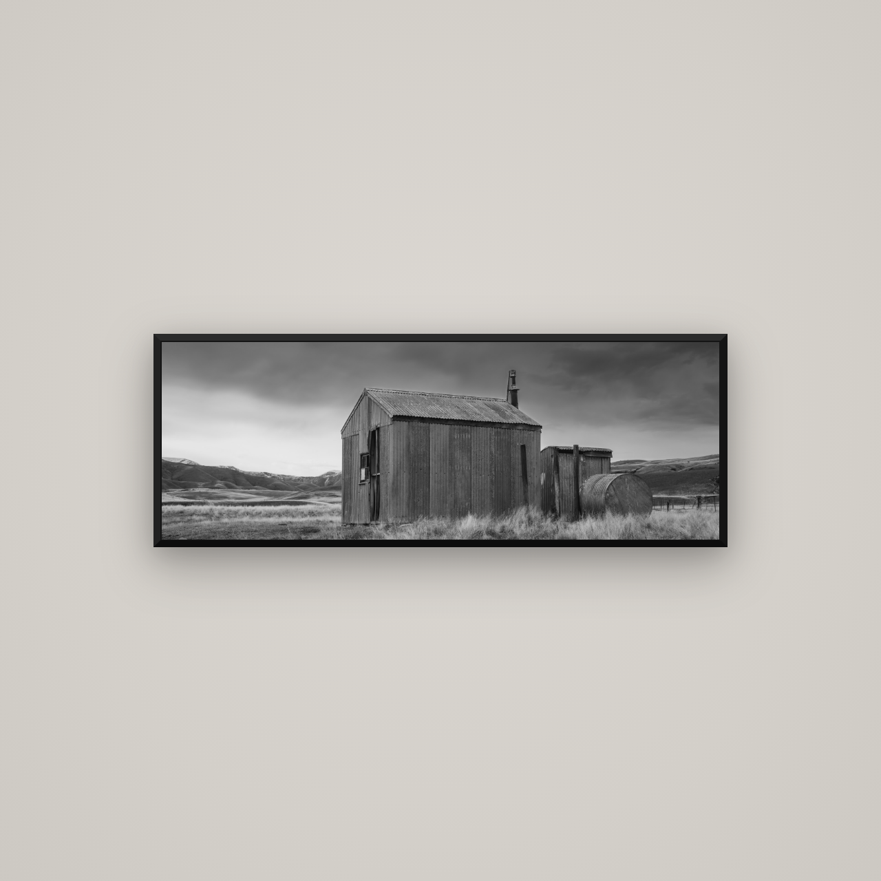 Whispers of Solitude, The Iron Hut — Basel Black Matte, 113×40 cm. New Zealand fine art wall art by Stephen Milner.