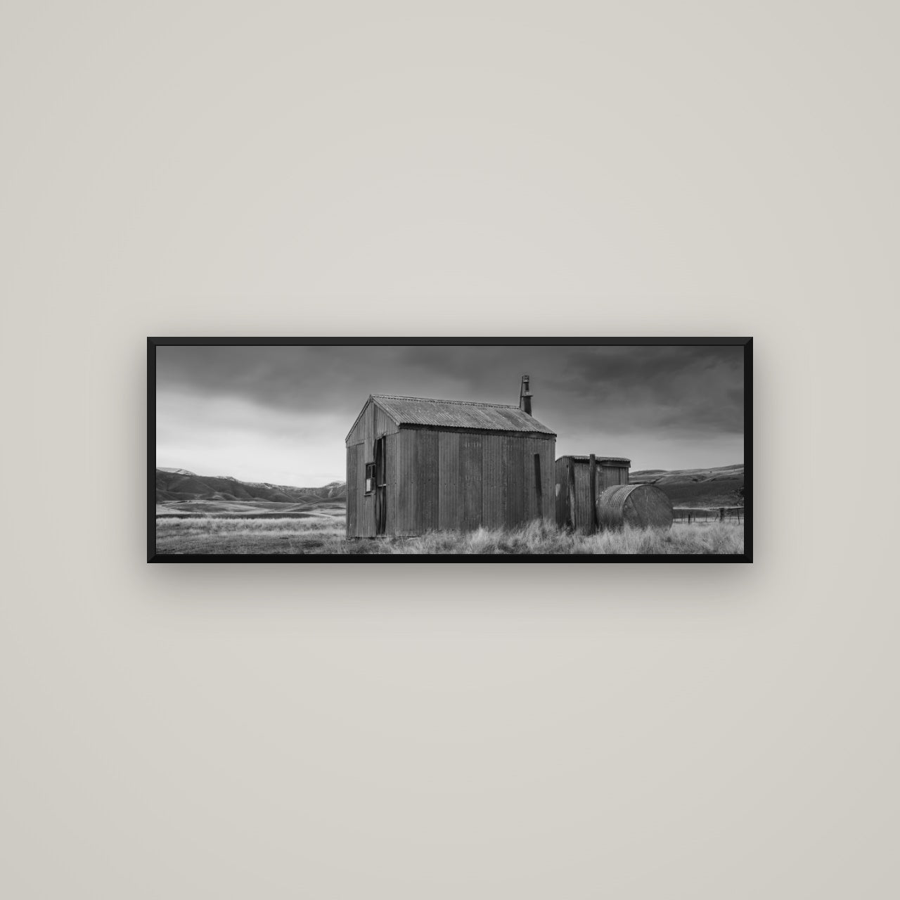 Whispers of Solitude, The Iron Hut — Basel Black, 113×40 cm. New Zealand fine art wall art by Stephen Milner.