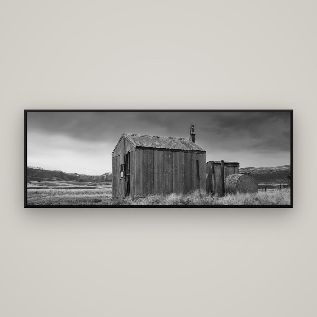 Whispers of Solitude, The Iron Hut — Basel Black Matte, 170×60 cm. New Zealand fine art wall art by Stephen Milner.