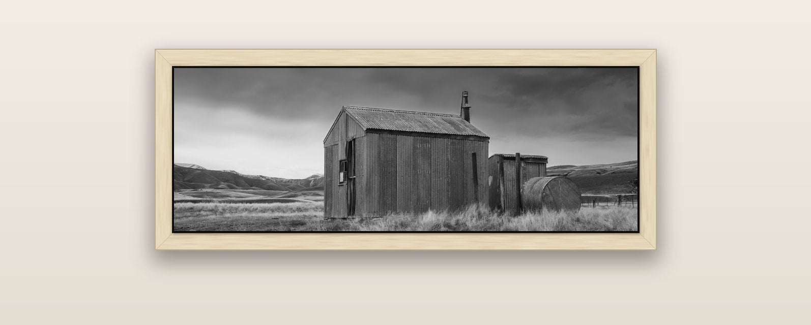Whispers of Solitude, The Iron Hut — natural float frame canvas, 102 × 36 cm. New Zealand fine art landscape wall art by Stephen Milner.