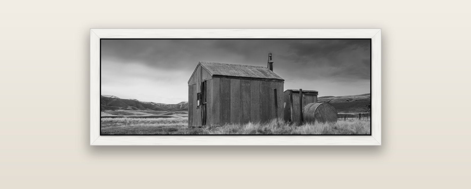 Whispers of Solitude, The Iron Hut — white float frame canvas, 102 × 36 cm. New Zealand fine art landscape wall art by Stephen Milner.