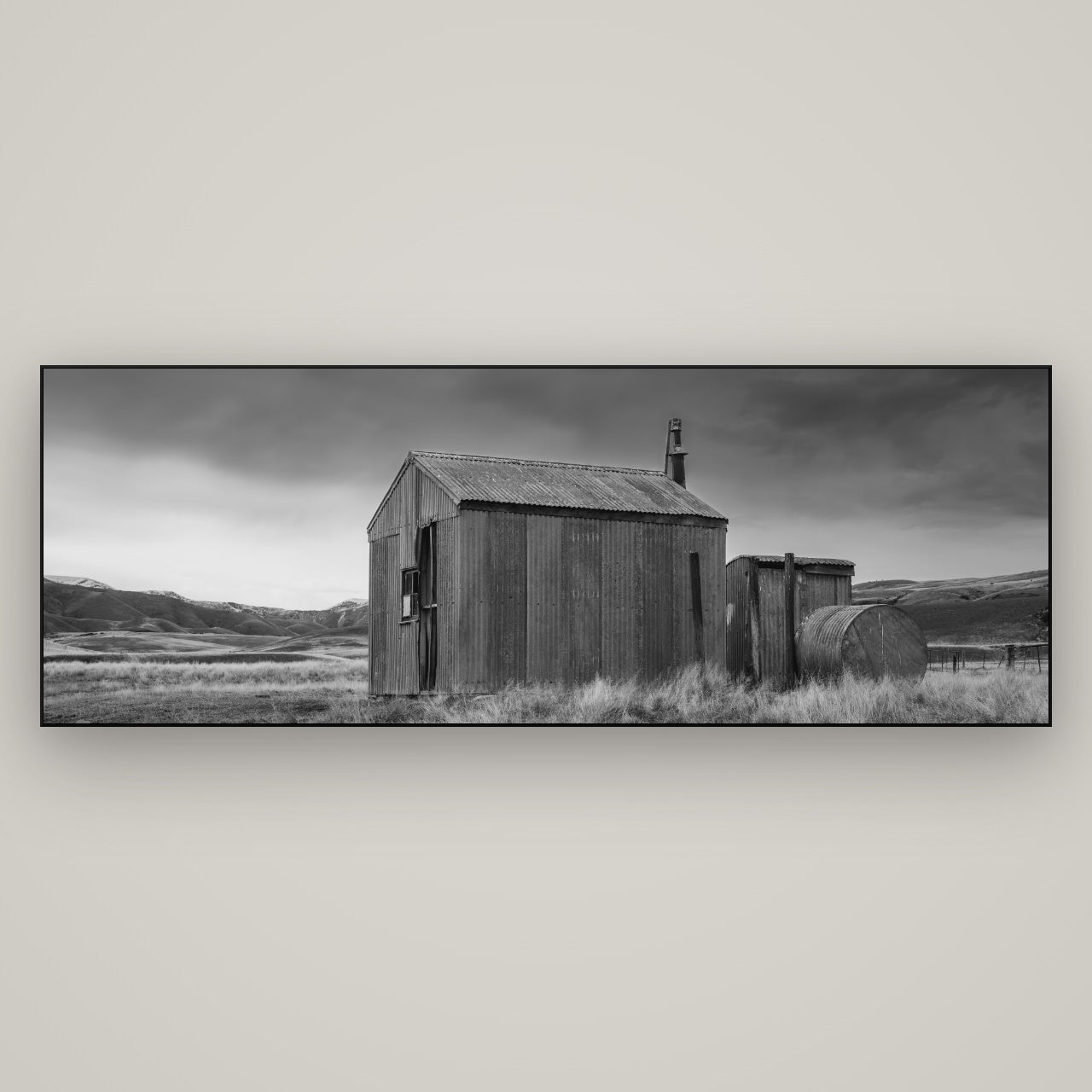 Whispers of Solitude, The Iron Hut — Slimline Black, 198×70 cm. New Zealand fine art wall art by Stephen Milner.