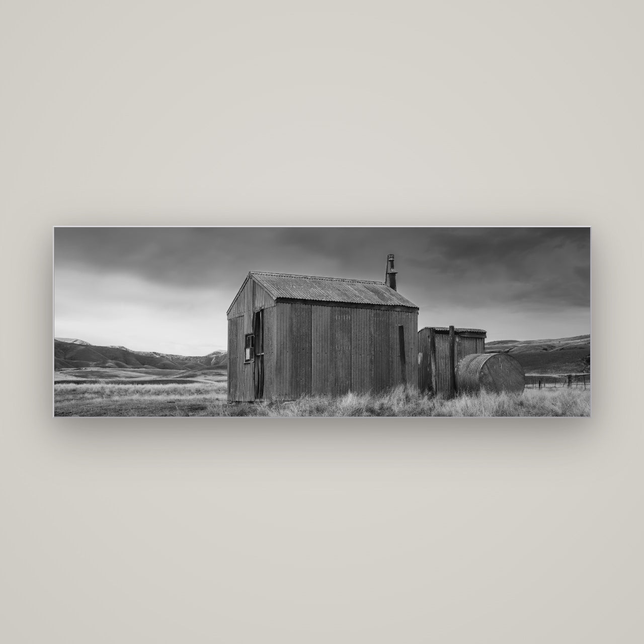 Whispers of Solitude, The Iron Hut — Slimline Silver, 170×60 cm. New Zealand fine art wall art by Stephen Milner.