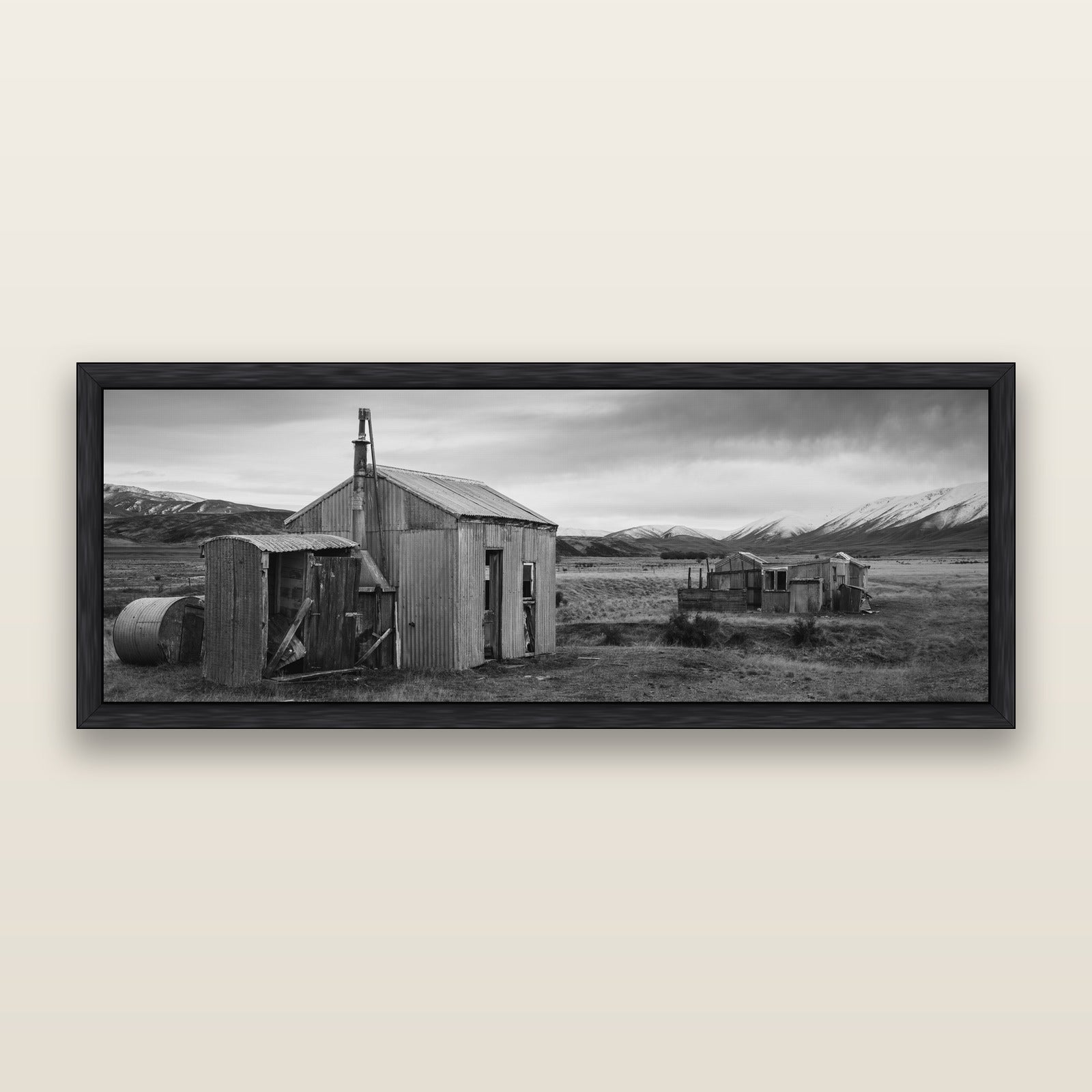 Whispers of Solitude, The Station Huts — black and white framed metallic canvas print, Black frame. New Zealand fine art wall art by Stephen Milner.