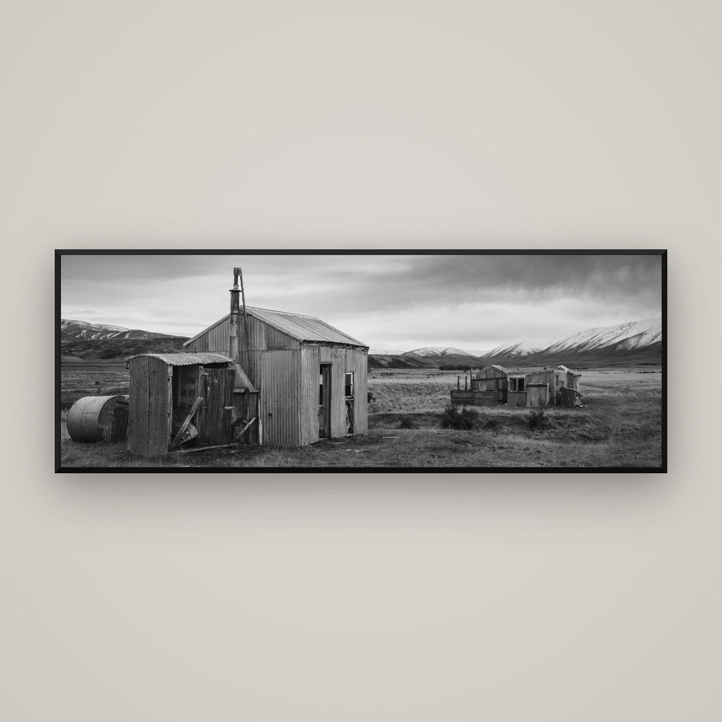 Whispers of Solitude, The Station Huts — Basel Black Matte, 170×60 cm. New Zealand fine art wall art by Stephen Milner.