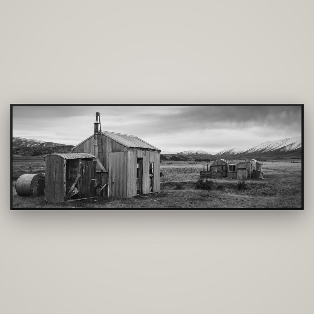 Whispers of Solitude, The Station Huts — Basel Black Matte, 198×70 cm. New Zealand fine art wall art by Stephen Milner.