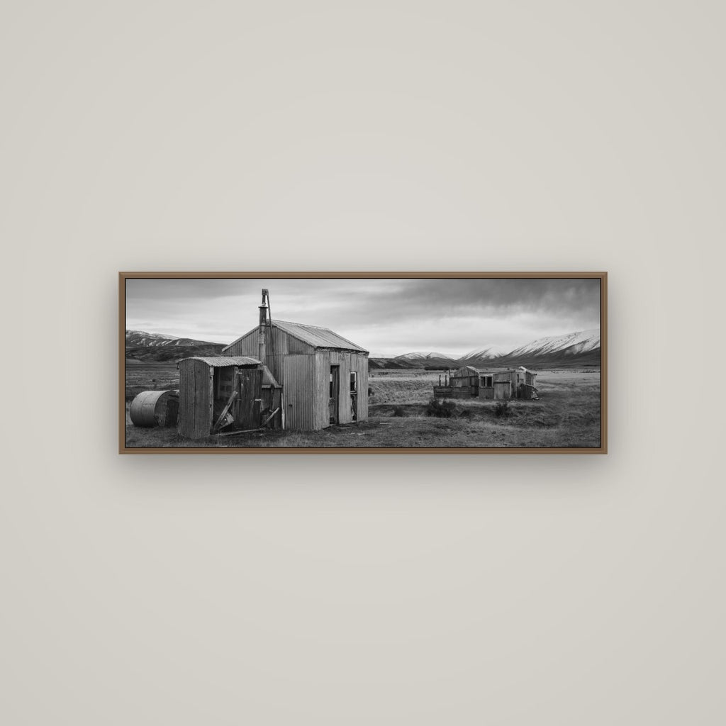 Whispers of Solitude, The Station Huts, Basel Walnut, 113×40 cm. New Zealand fine art wall art by Stephen Milner.