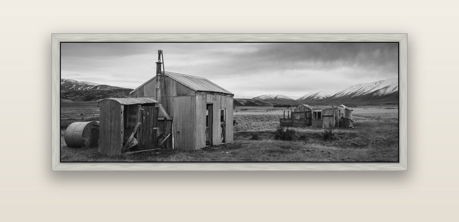Whispers of Solitude, The Station Huts — silver float frame canvas, 152 × 56 cm. New Zealand fine art landscape wall art by Stephen Milner.