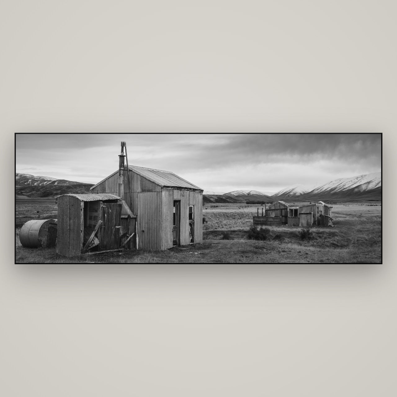 Whispers of Solitude, The Station Huts — Slimline Black, 198×70 cm. New Zealand fine art wall art by Stephen Milner.